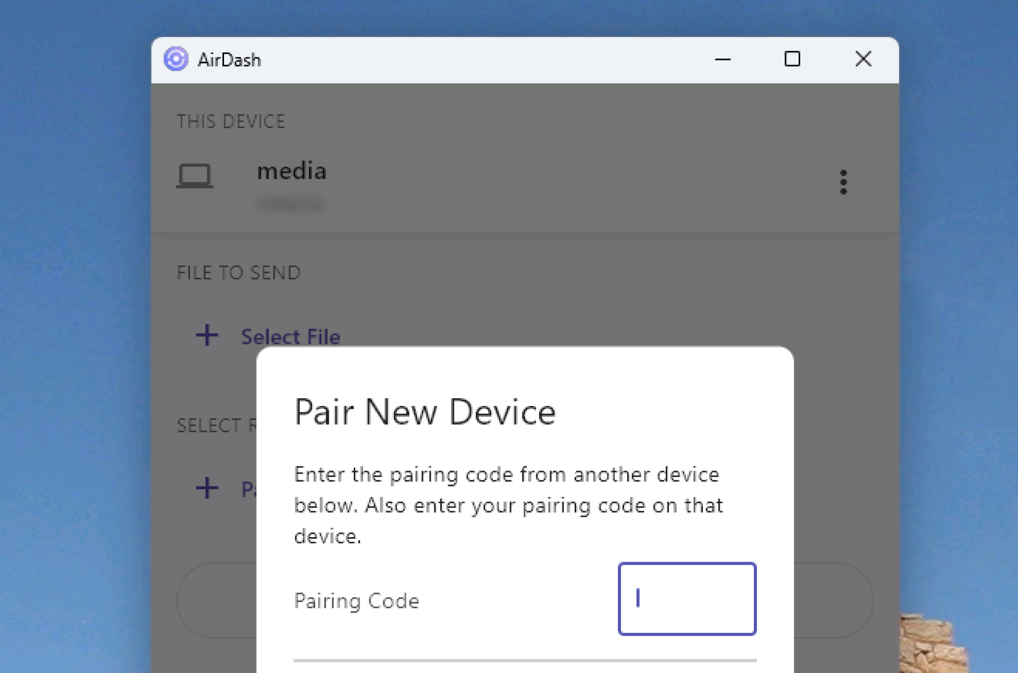 A pop-up window says Pair New Device and asks for the pairing code from the other device.